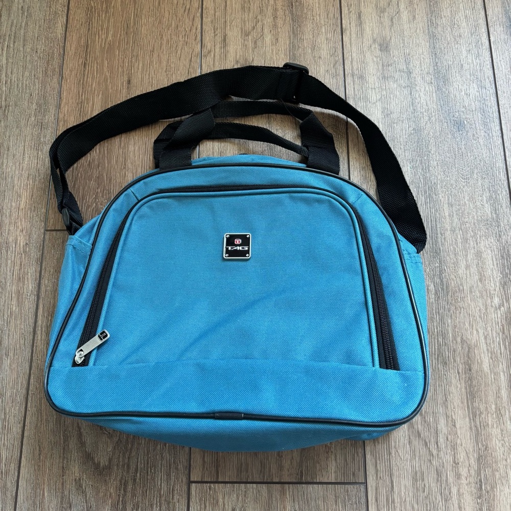 Tag blue small travel bag with straps